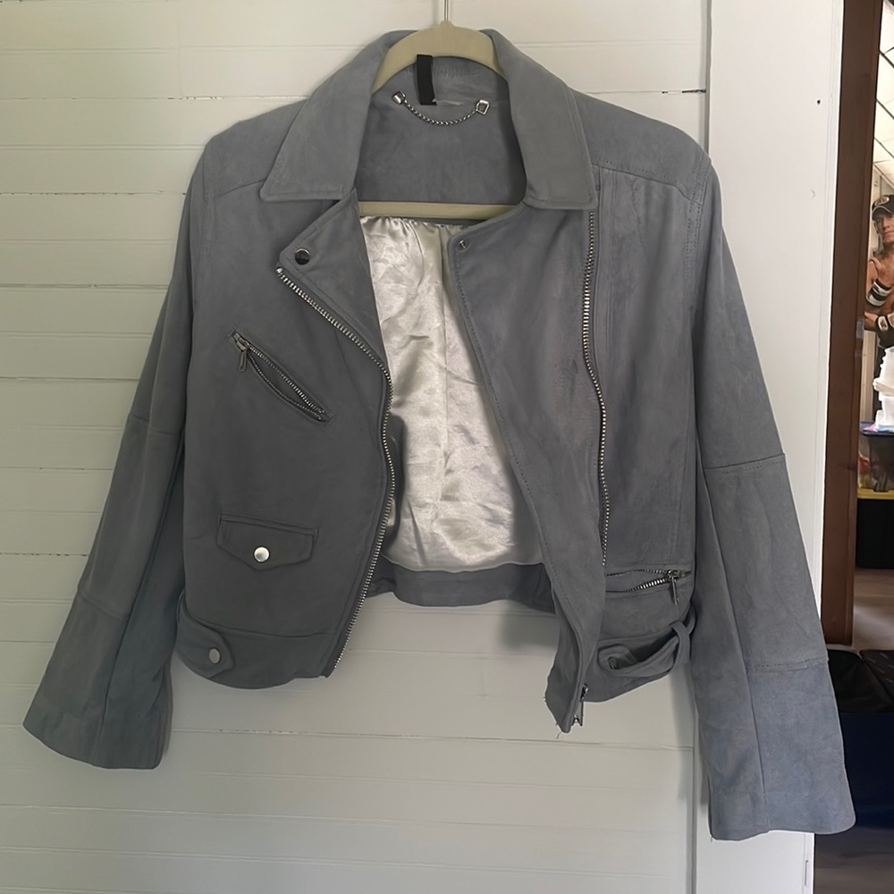 Light blue suede moto jacket with silk lining and silver accents